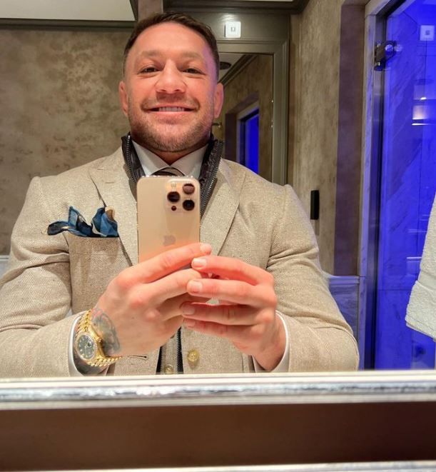 McGregor snapped a mirror selfie in his custom-made suit and watch worth around €120k.