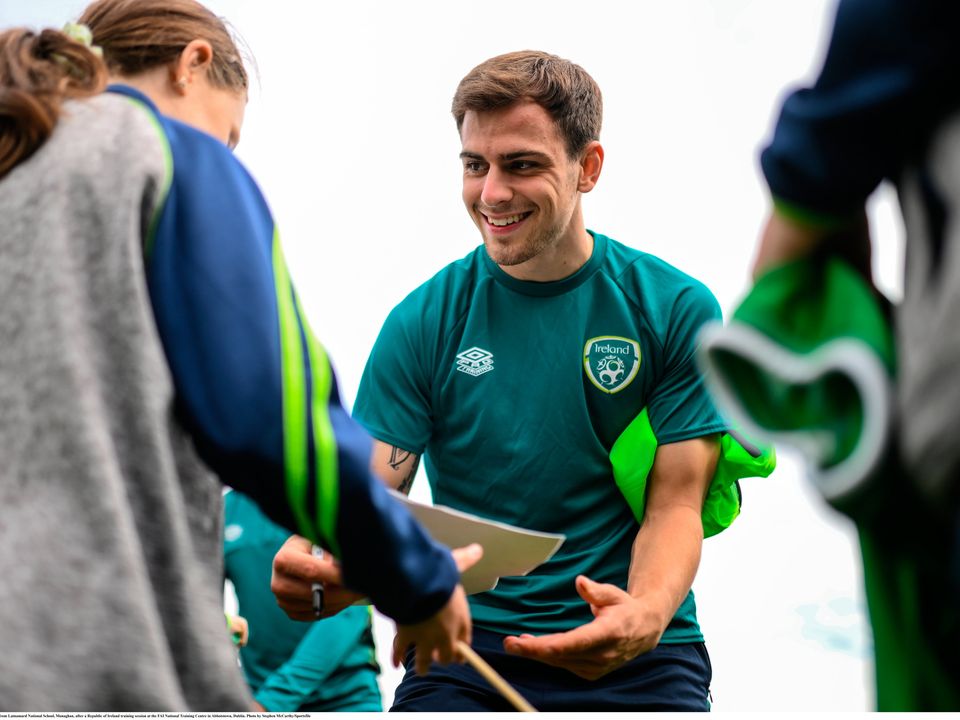Jayson Molumby signs autographs for pupils from Latnamard National School, Monaghan, after a Republic of Ireland training in Abbotstown. Photo: Stephen McCarthy/Sportsfile