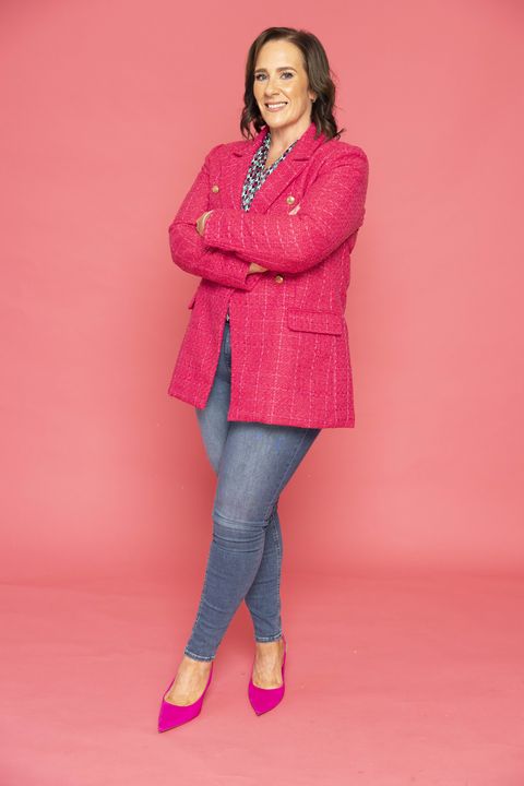 Alexandria wears a pink boucle blazer, €34.99, and jeans, €39.99