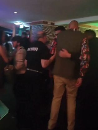 Tyson Fury surrounded by security guards. Photo: X