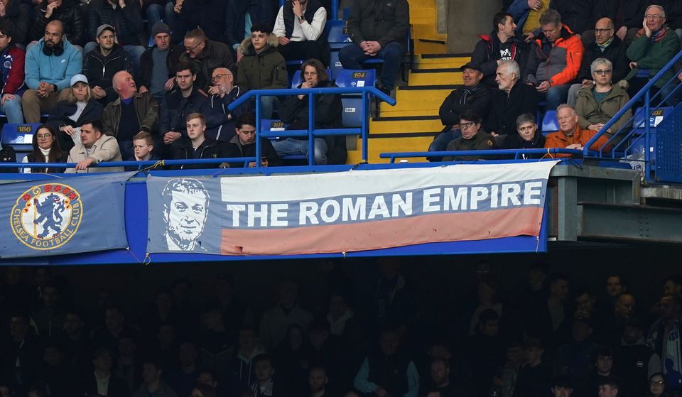 A banner in the colours of the Russian flag showing Roman Abramovich’s face and reading ‘The Roman Empire’ was displayed at Stamford Bridge on Sunday (Adam Davy/PA)