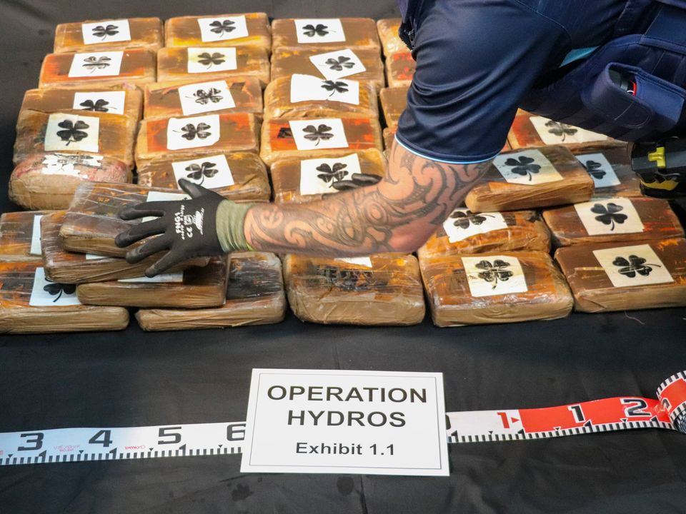 A shipment of cocaine found floating on the surface of the Pacific Ocean is stacked on a table in Auckland, New Zealand Photo: NZ Police via AP