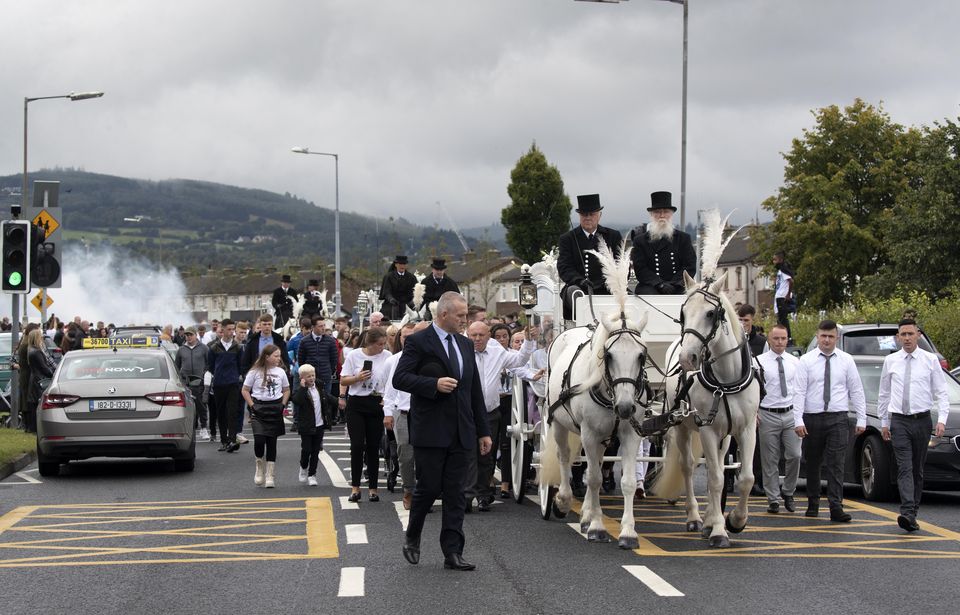 The cortege makes its way to the cemetery following the funeral of Lisa Cash and twin siblings Chelsea and Christy Cawley who died in an attack last Saturday night. Photo: Colin Keegan, Collins Dublin
