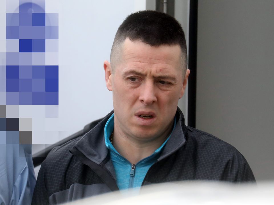 Thomas Hinchon as he is led into Blanchardstown court after being caught with a mobile phone behind bars