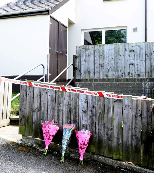 Flowers left at the murder scene of Eamonn 'spud' O'Hanlon 36, who was stabbed to death in Gilford, County Down, in the early hours of Saturday. Father of Two O'Hanlon, was stabbed outside an address on Hill Street and later died from his injuries, police said.