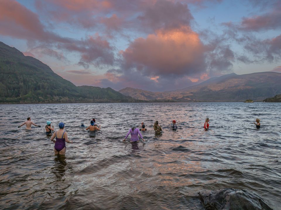 Hardy swimmers brave a sunrise dip in Muckross Lake
