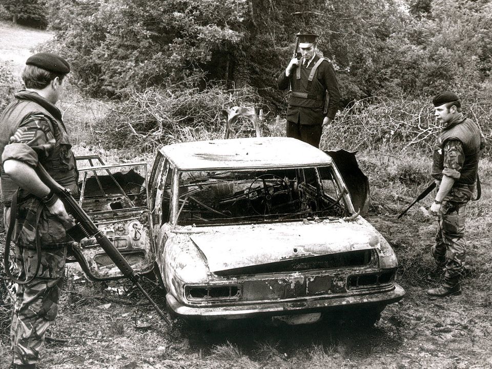 Photograph shows the burned out car of murdered Patsy Kelly