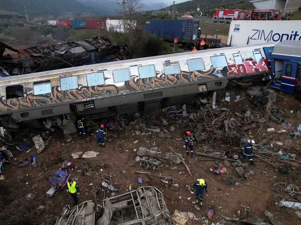 Rescue crews operate at the site of a crash, where two trains collided, near the city of Larissa, Greece, March 1, 2023. REUTERS/Alexandros Avramidis