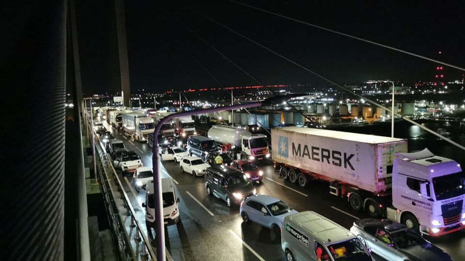 Handout photo issued by Just Stop Oil of traffic stopped after two of their activists scaled the Queen Elizabeth II Bridge at the Dartford Crossing 