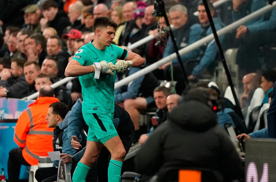 Newcastle United goalkeeper Nick Pope leaves the pitch after being being shown a red card. Photo: Owen Humphreys/PA
