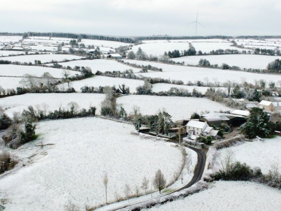 Snow blankets the townland of Ardateggle in Co Laois. PA