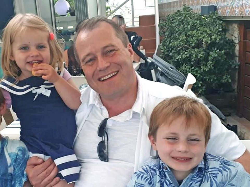 Conor, Darragh and Carla McGinley with their father Andrew