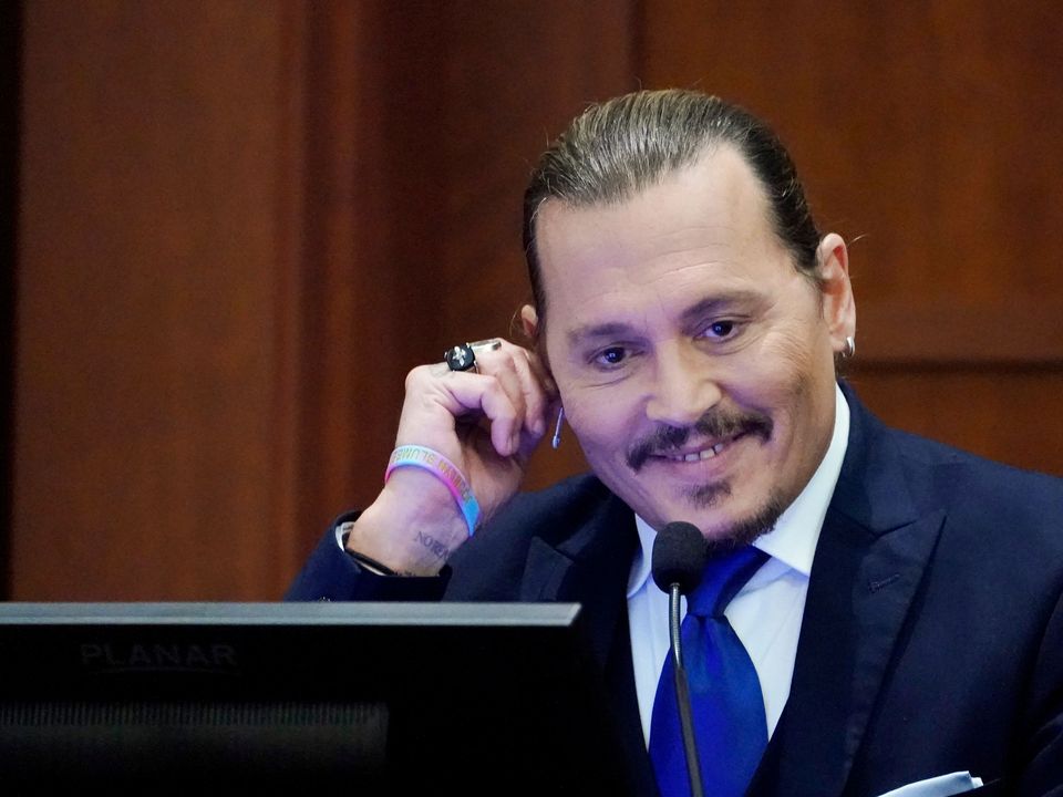 Johnny Depp said texts about drowning Amber Heard were based on a Monty Python sketch (Steve Helber/AP)