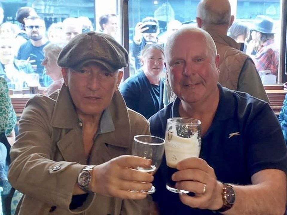 Bruce Springsteen enjoys a pint