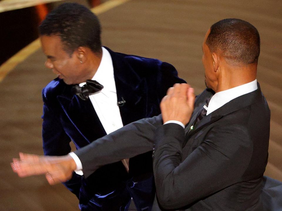 Will Smith hits Chris Rock on stage. Photo: Brian Snyder/Reuters