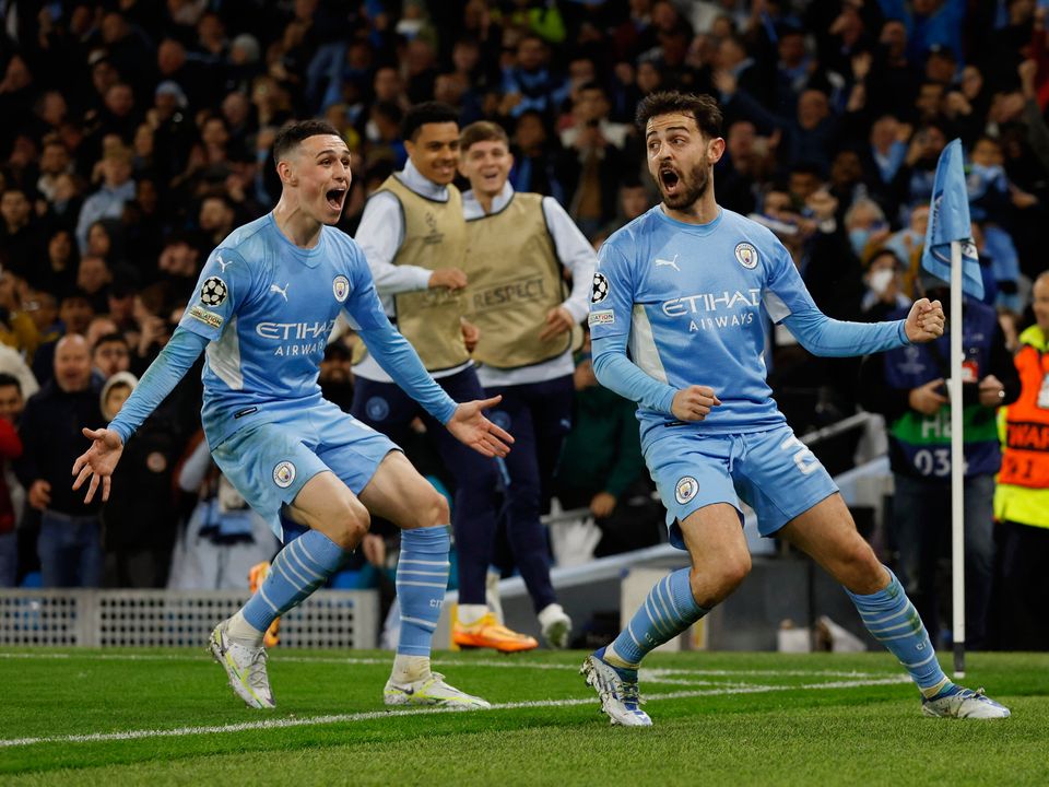 Manchester City's Bernardo Silva celebrates scoring their fourth goal with Phil Foden Action Images via Reuters/Jason Cairnduff