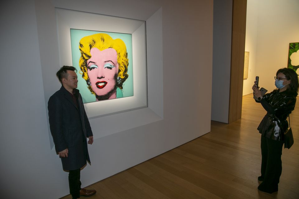 The famous image shows a close-up portrait of actress Marilyn Monroe, depicted in vibrant block colours (Ted Shaffrey/AP)