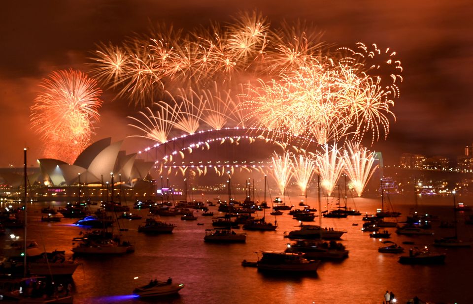 Fireworks explode over Sydney Harbour for New Year. Photo: Reuters / Jaimi Joy