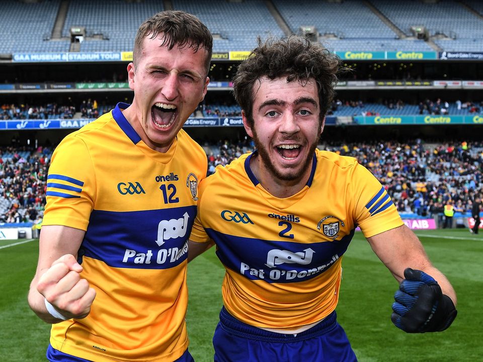Emmet McMahon, left, and Manus Doherty celebrate after Clare's famous victory. Photo by Piaras Ó Mídheach/Sportsfile