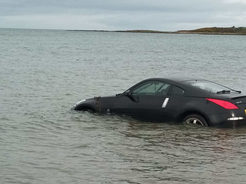 Car in sea. Photo: Richard Sullivan