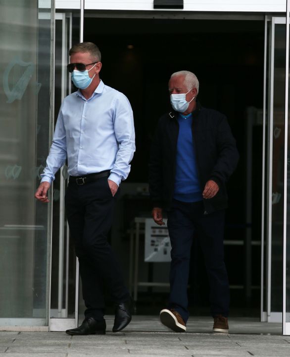 Jonathan Dowdall (left) with his father Patrick leaving court