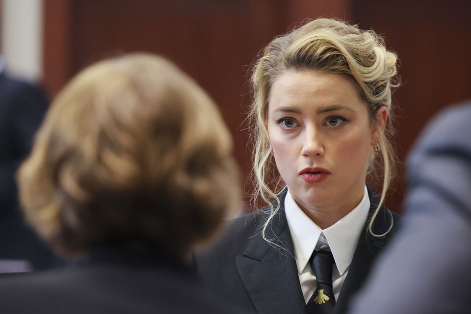 Amber Heard at the Fairfax County Circuit Courthouse (Evelyn Hockstein/Pool Photo via AP)