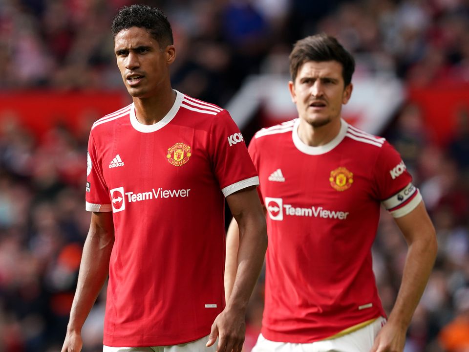 Raphael Varane (left) and Harry Maguire are at the heart of the Manchester United defence (Martin Rickett/PA)