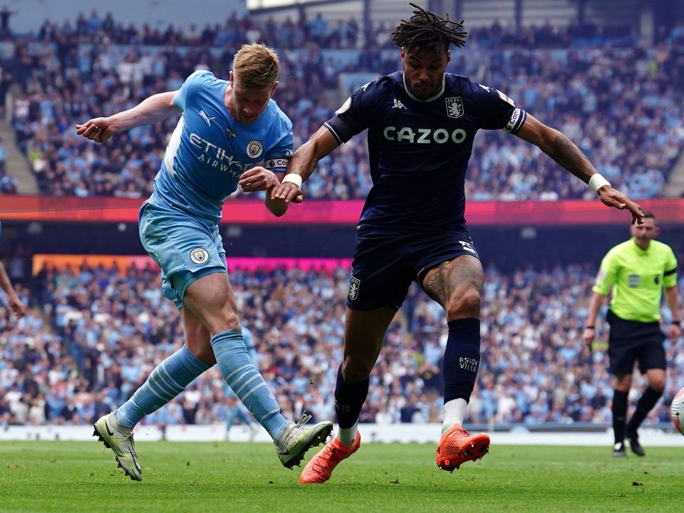 Kevin De Bruyne crosses the ball for substitute Ilkay Gundogan to score the winner in Man City’s title-clinching 3-2 comeback victory over Aston Villa (Martin Rickett/PA Images).