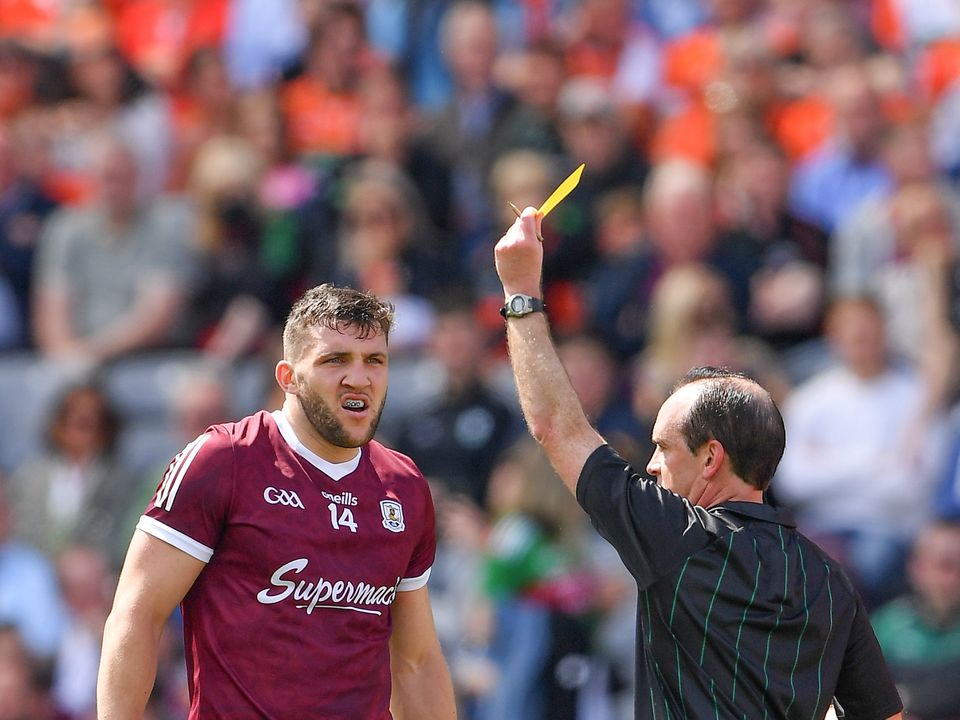 26 June 2022; Damien Comer of Galway is shown a yellow card by referee David Coldrick during the GAA Football All-Ireland Senior Championship Quarter-Final match between Armagh and Galway at Croke Park, Dublin. Photo by Ray McManus/Sportsfile