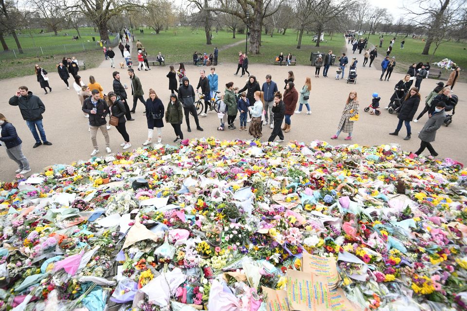 Floral tributes left at the bandstand in Clapham Common (Victoria Jones/PA)