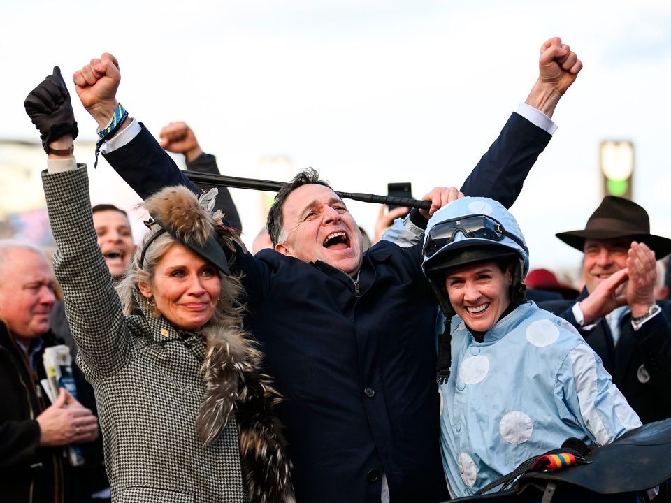 Trainer Henry de Bromhead, his wife Heather, left, and winning jockey Rachael Blackmore after Honeysuckle won the Mares' Hurdle. Photo by Seb Daly/Sportsfile