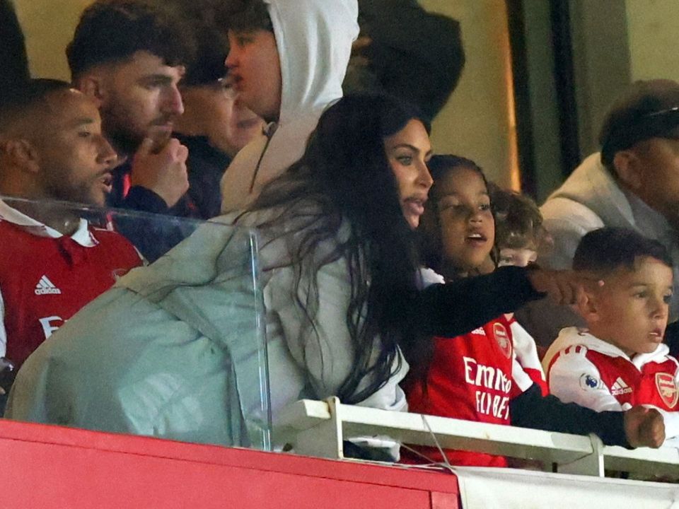 Kim Kardashian watches from the stands with her son Saint West during the UEFA Europa League round of 16 leg two match between Arsenal FC and Sporting CP at Emirates Stadium on March 16, 2023 in London, United Kingdom. (Photo by Marc Atkins/Getty Images)