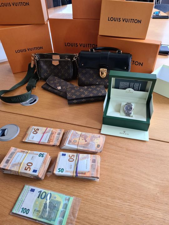 Cash and goods seized by CAB. Photo: An Garda Siochana