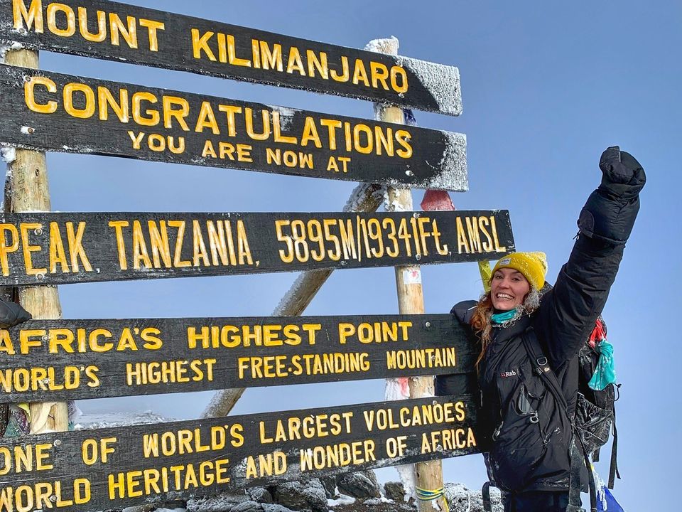 Eleanor McAree at the top of Mount Kilimanjaro
