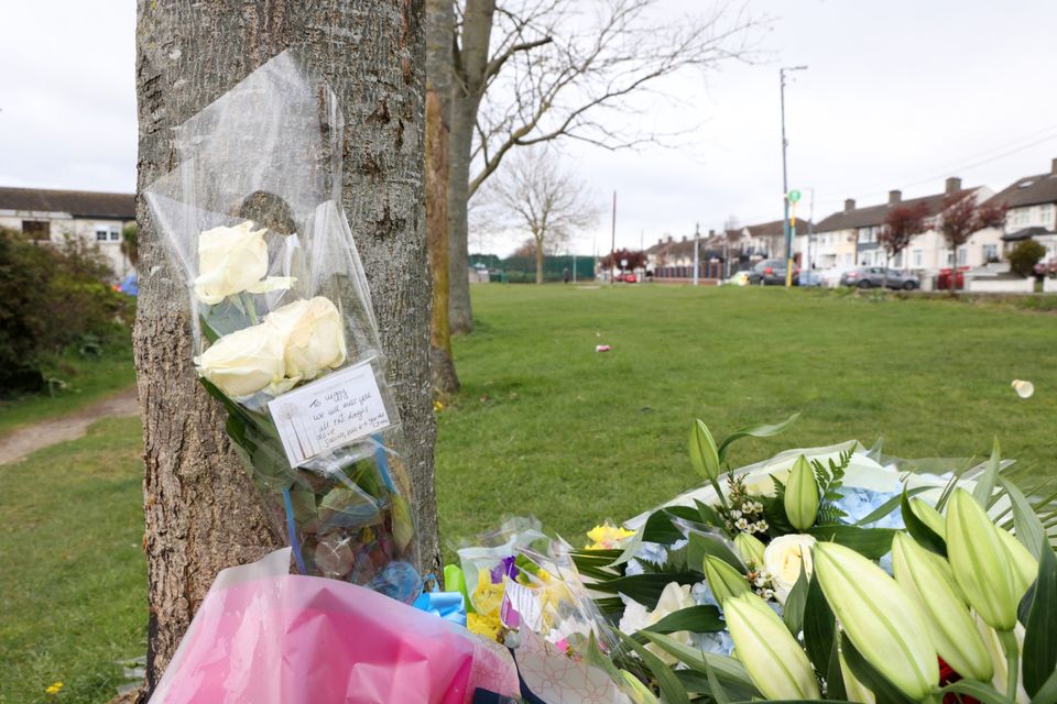 Flowers left close to the scene where James Whelan was murdered