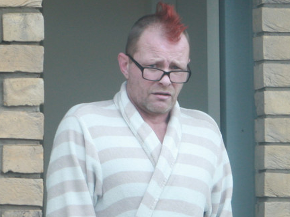 Roger Hunt called police because wife Natalie would not get off the couch in their home