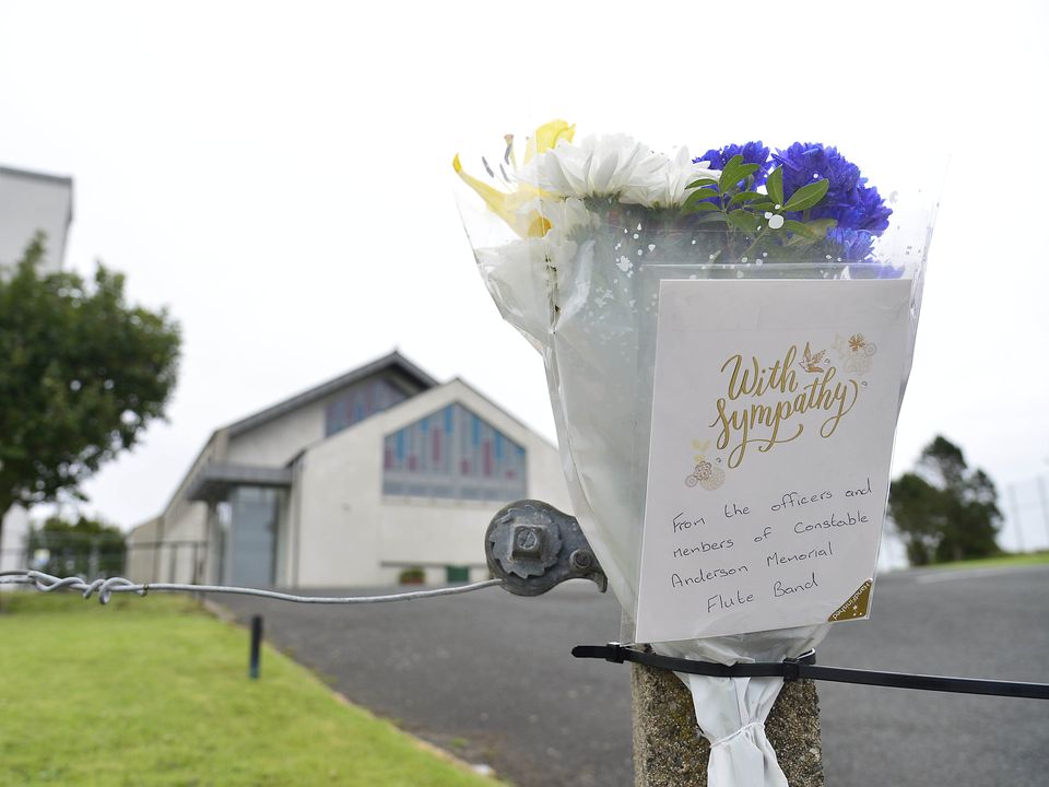 Pacemaker Press: 10 July 2022:   Flowers left at the scene in tribute