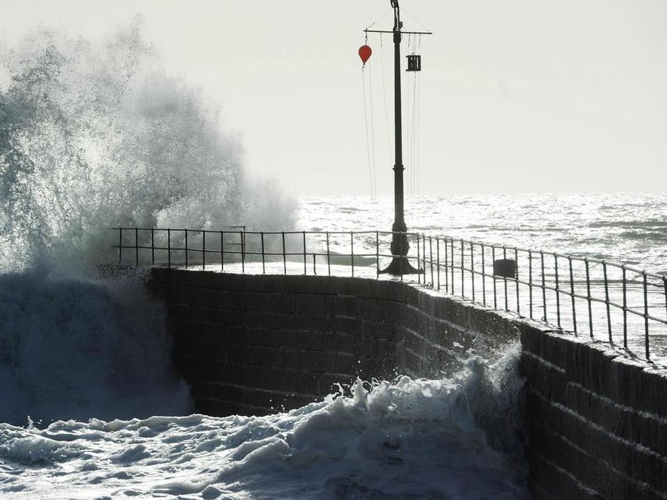 Homes and businesses warned to secure outdoor furniture and Christmas decorations, people warned to stay away from dangerous coastal areas (Tim Ireland/PA)