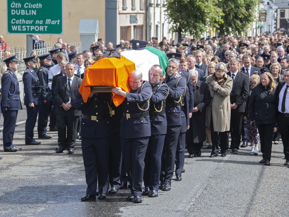 Huge crowds turned out to pay tribute to Det Gda Horkan during his funeral in Charlestown, Co. Mayo