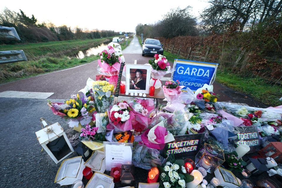 Floral tributes laid at the Grand Canal in Tullamore, Co Offaly, where primary school teacher Ashling Murphy was found dead in January (Brian Lawless/PA)