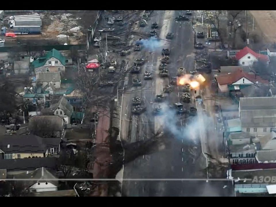 Tanks seen being destroyed on the outskirts of Brovary, Ukraine, in a video screengrab. Photo: Azov/Handout via Reuters
