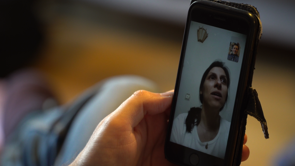 Nazanin is seen on Facetime with Richard from Iran (Darius Bazargan/PA)