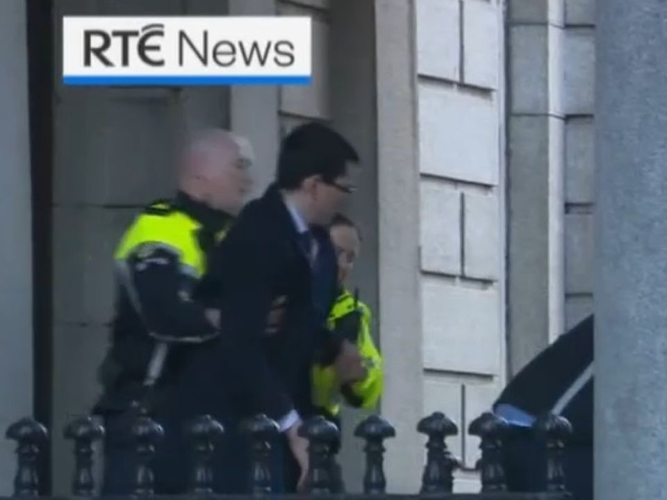 Enoch Burke being removed from court. Photo credit: RTE News