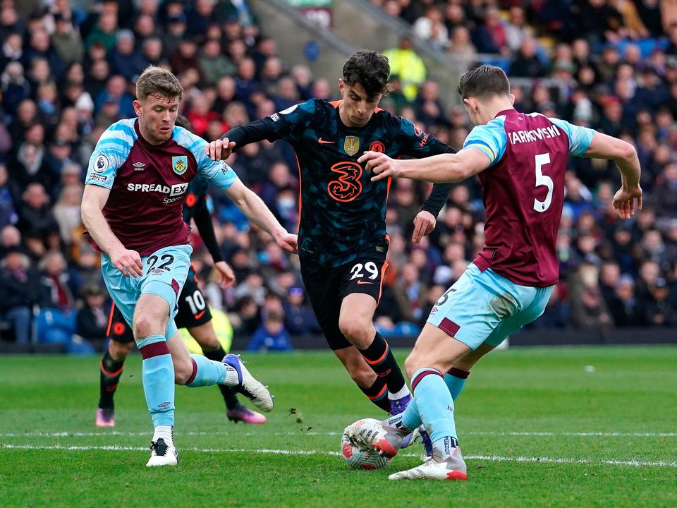 Chelsea's Kai Havertz (centre) battles for the ball with Burnley's Nathan Collins (left) and James Tarkowski during their Premier League match at Turf Moor last Saturday.