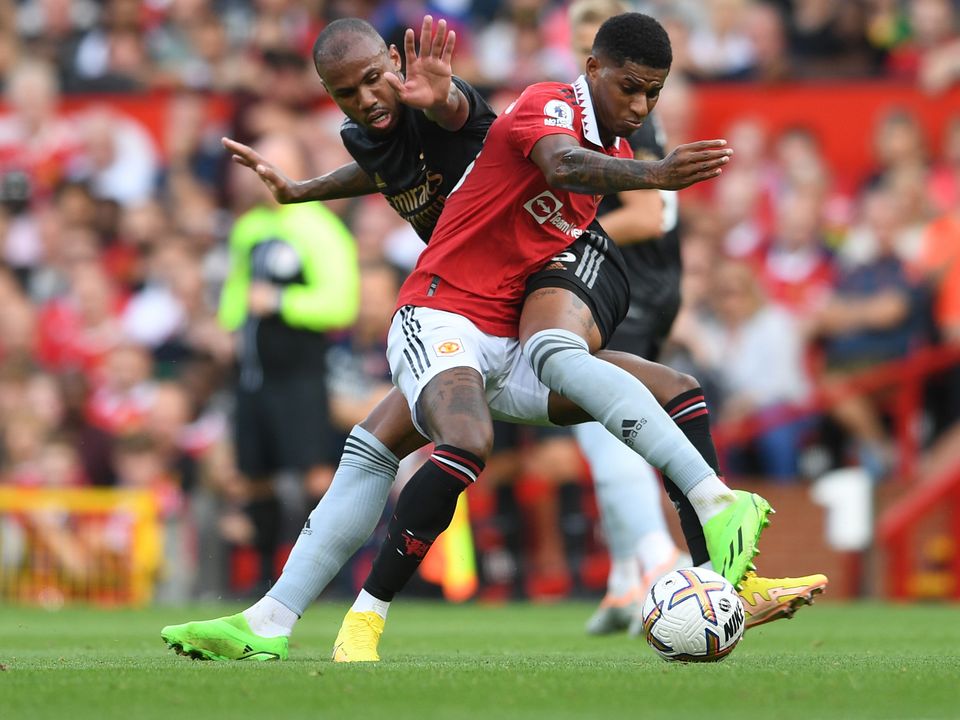 Gabriel Magalhaes of Arsenal challenges Marcus Rashford of Manchester United at Old Trafford. Photo: by David Price/Arsenal FC via Getty Images