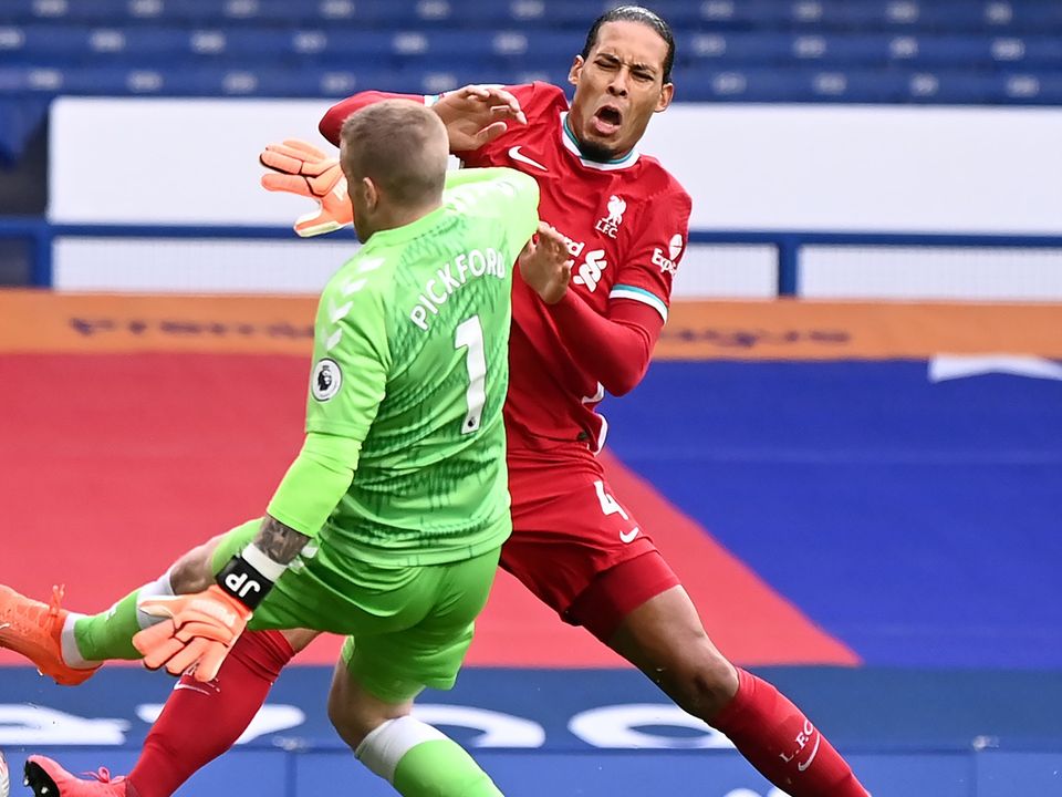 Virgil Van Dijk requires surgery after suffering knee ligament damage in Liverpool’s draw with Everton (Laurence Griffiths/PA).