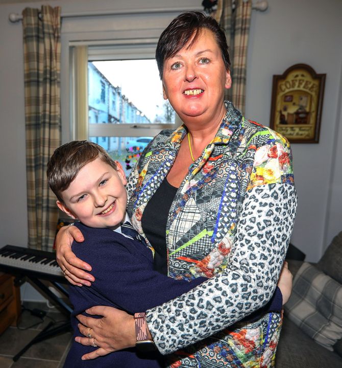 Callum having a cuddle with mum Fiona Mulhern