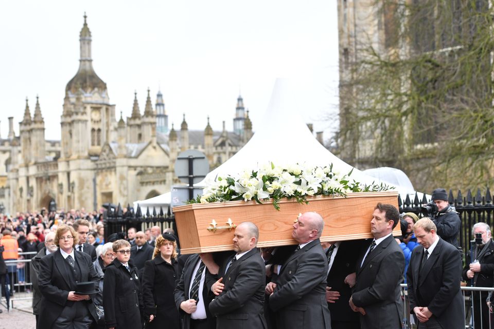 The coffin containing Professor Stephen Hawking is carried into the University Church of St Mary the Great in Cambridge (Joe Giddens/PA)