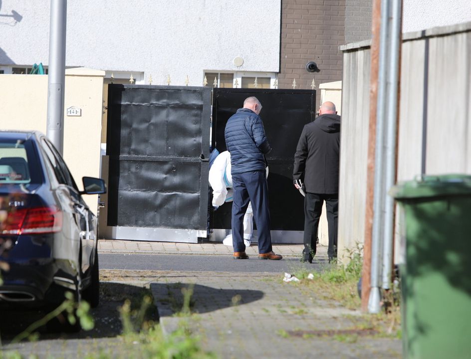 Gardai and Garda Technical Bureau at the scene at Sandyhill Gardens Ballymun Dublin after the body of a a female was discovered deceased in unexplained circumstances. Pic Garrett White/ Collins Photos