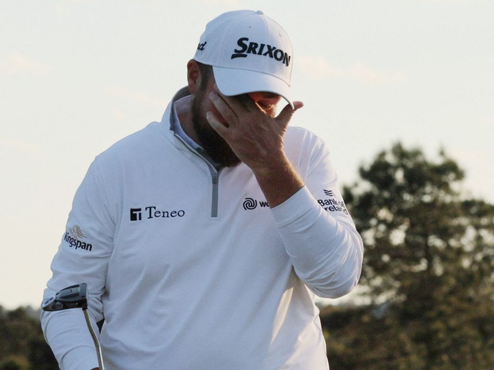 Ireland's Shane Lowry reacts after his shot on the 18th during the third round
